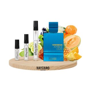 Decant de perfume Al Haramain Amber Oud Aqua Dubai en atomizador. Fragancia unisex cítrica, frutal y limpia con notas de bergamota, mandarina, melón y almizcle.