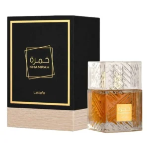 Perfume Lattafa Khamrah Edp 100ml frasco transparente y cuadrado con tapa dorada fragancia oriental especiada gourmand unisex con canela datiles vainilla.