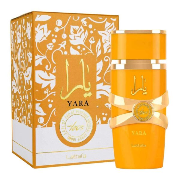 Perfume Lattafa Yara Tous Edp 100ml frasco naranja durazno con detalles dorados fragancia floral frutal tropical de mango coco y vainilla para mujer.