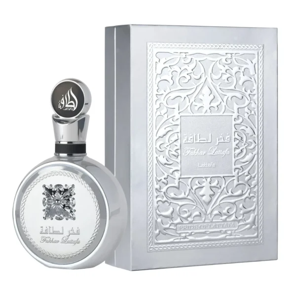fakhar.platinum.edp.100ml Perfume Lattafa Fakhar Platinum 100 ml EDP. Fragancia masculina fresca con notas de manzana, salvia y maderas. Botella metálica plateada con detalles intrincados de diseño árabe.