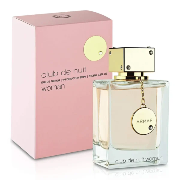 Perfume Armaf Club De Nuit Woman 105 ml EDP. Fragancia femenina elegante con notas de cítricos, rosa, lichi y pachulí. Botella de diseño lujoso en color ámbar/oro con cristales.